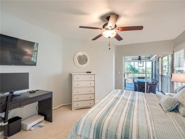 Guest bedroom has sliders to lanai