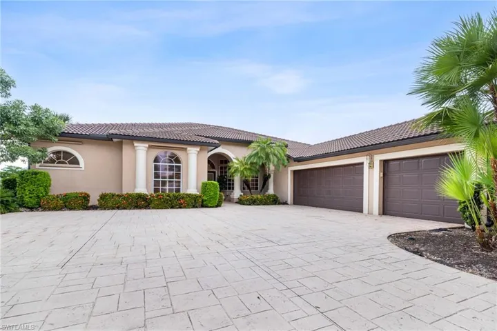 Large driveway with 3 car garage
