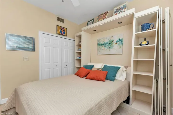 Bedroom featuring a closet and ceiling fan