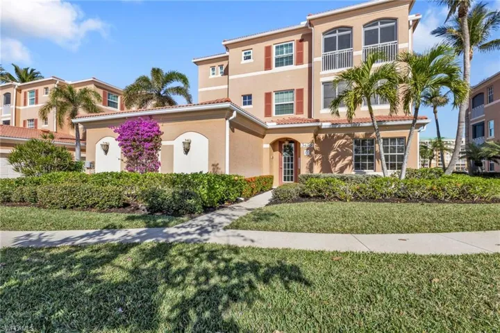 View of front of property with a front lawn