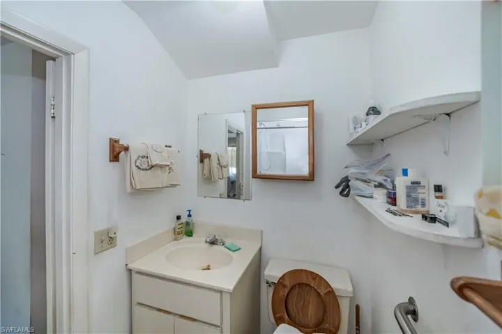 Bathroom with toilet and vanity