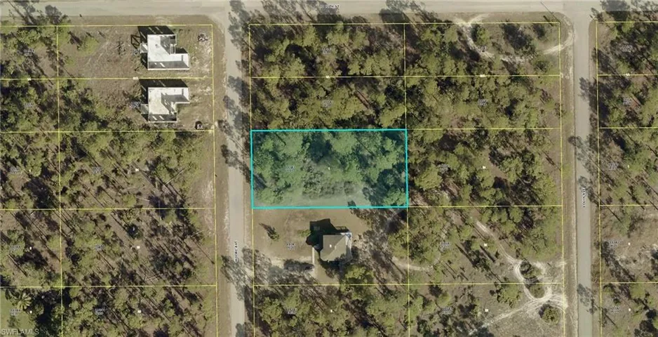 Aerial map of property and surrounding area featuring property parcel outlined