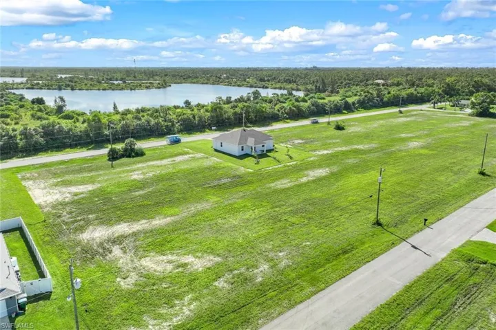 Drone / aerial view featuring a rural view and a water view