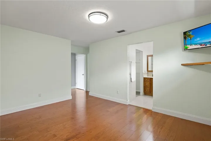 Empty room featuring light hardwood / wood-style flooring