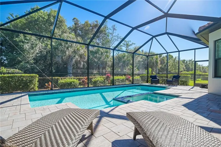 Upgraded pool and spa with screened-in lanai