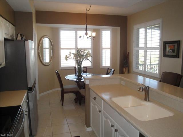 Lots of natural light. Plantation Shutters. All new appliances. Solid surface counter with under-mounted sink.