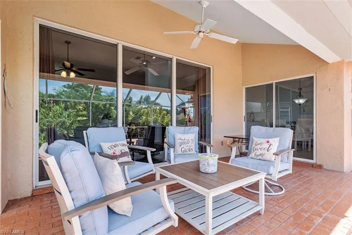 View of patio featuring ceiling fan and outdoor dining space