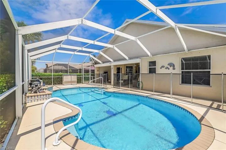 View of pool featuring a lanai and a patio