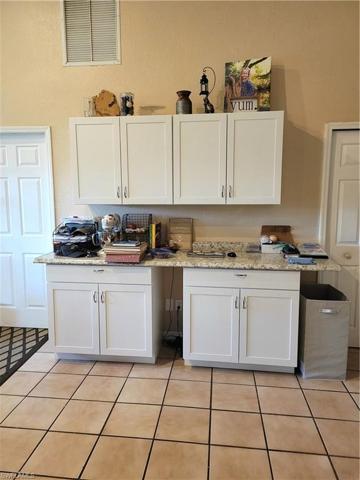 Extra storage cabinets off of kitchen