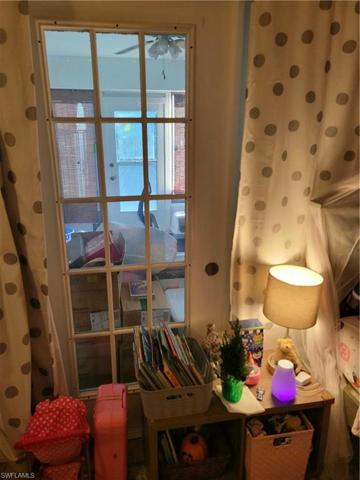 Spare bedroom with French Door to lanai sunroom
