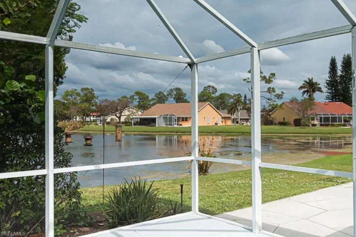 Unfurnished sunroom with a water view