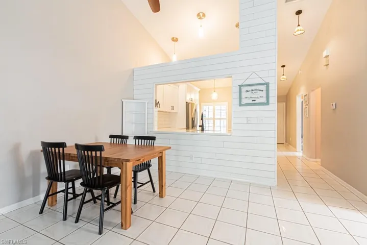 Dining area featuring light tile patterned floors