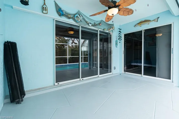 View of patio with ceiling fan