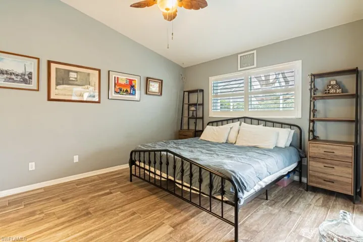 Unfurnished bedroom featuring ceiling fan