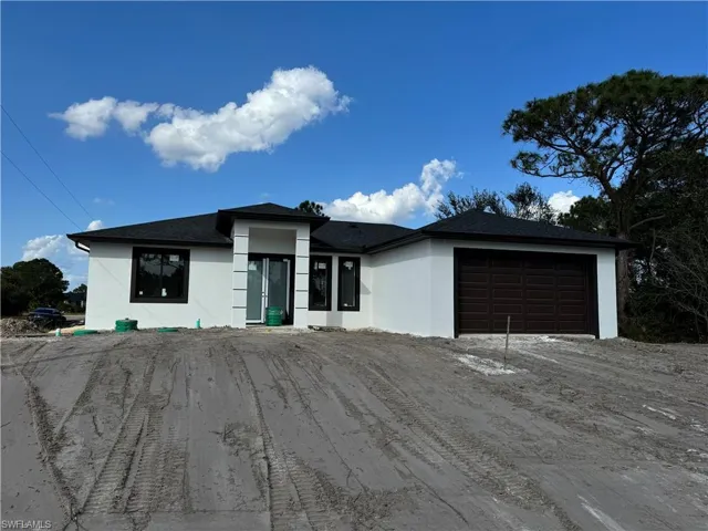 View of front facade with a garage
