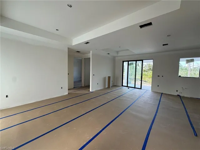 Empty room with a raised ceiling