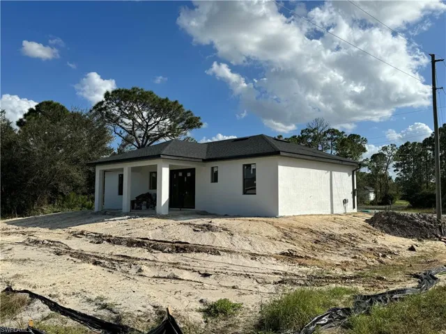 View of front facade with a patio