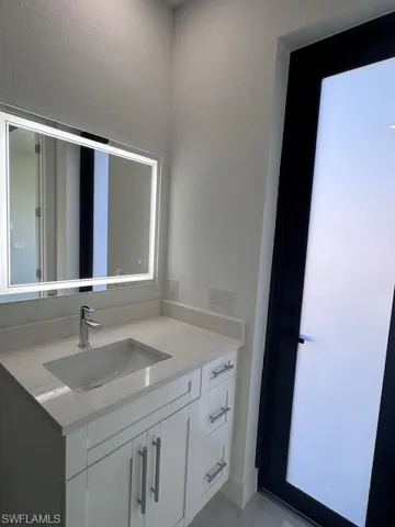 Bathroom featuring vanity