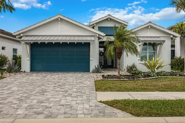 View of front of property with a garage