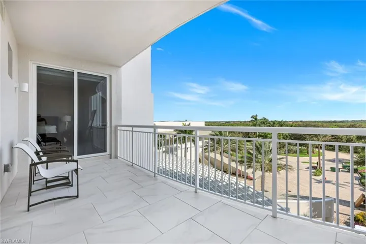 Open-air balcony, on east side of building, with sweeping views and plenty of space to relax, sip your morning coffee, and soak in the Florida sunshine.