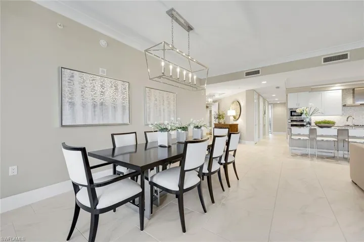 Another view of the dining area looking toward the kitchen — perfect for hosting family holidays and dinner parties!