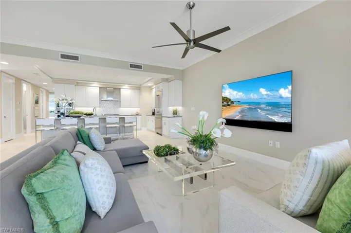View of the great room looking toward the open kitchen — ideal for effortless everyday living and entertaining.
