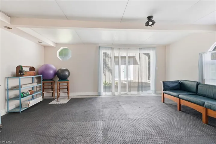 Flex Room, being used as a workout space with foam mat flooring