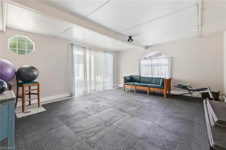 Flex Room, being used as a workout space with foam mat flooring