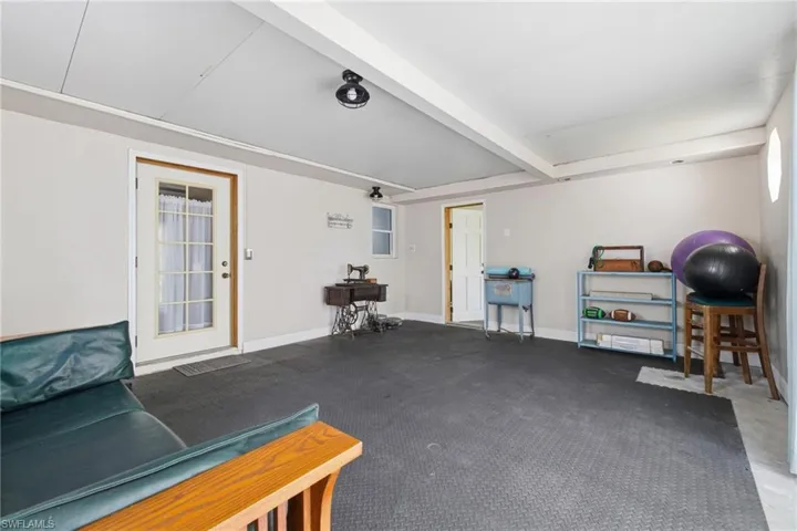 Flex Room, being used as a workout space with foam mat flooring