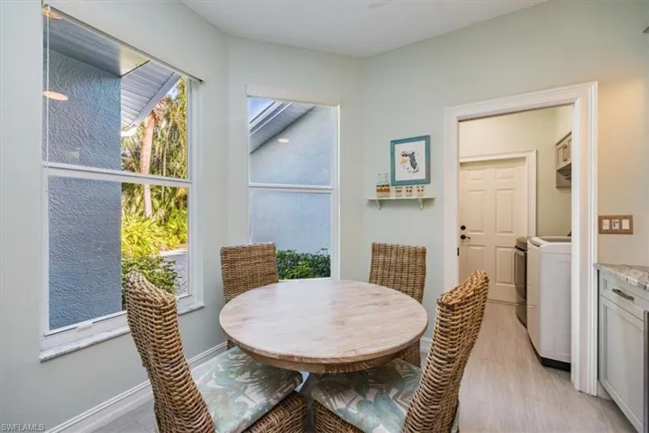 In Kitchen breakfast nook with designer furnishings and lovely views to start your morning in paradise.