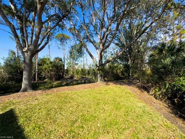 Expansive and private rear yard makes this villa live like a single family home!
