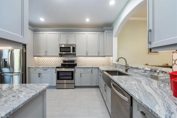 This is an entertainers dream kitchen featuring an abundance of storage, high end built in features, breakfast room off the kitchen and  plenty of room for multiple cooks in the kitchen!