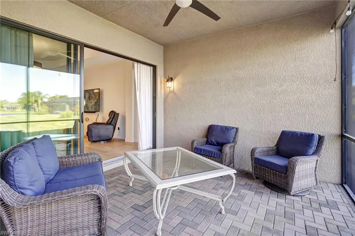 View of patio with a ceiling fan