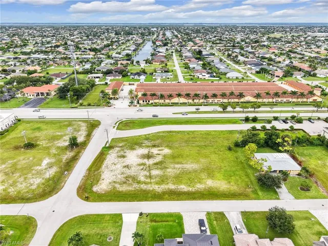 Aerial view of residential area with a nearby body of water