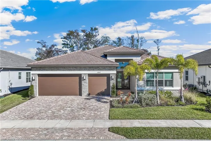 12047 Oleander Ave - popular Sunrise floorplanwith both preserve and lake views!