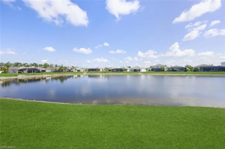 Water view with nearby suburban area