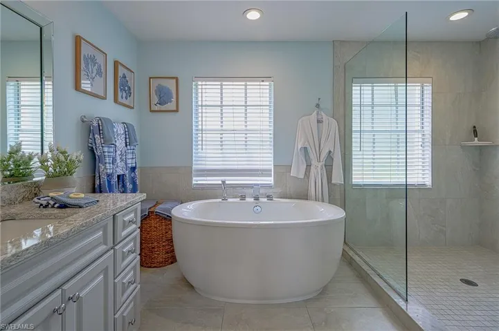 Soaking tub, shower and two vanities in this wonderful bath!