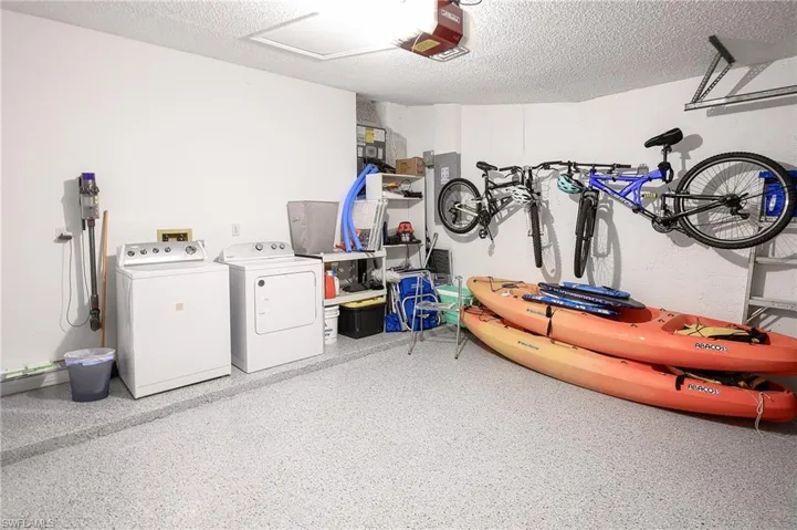2 car garage with bikes, kayaks, helmets and more!