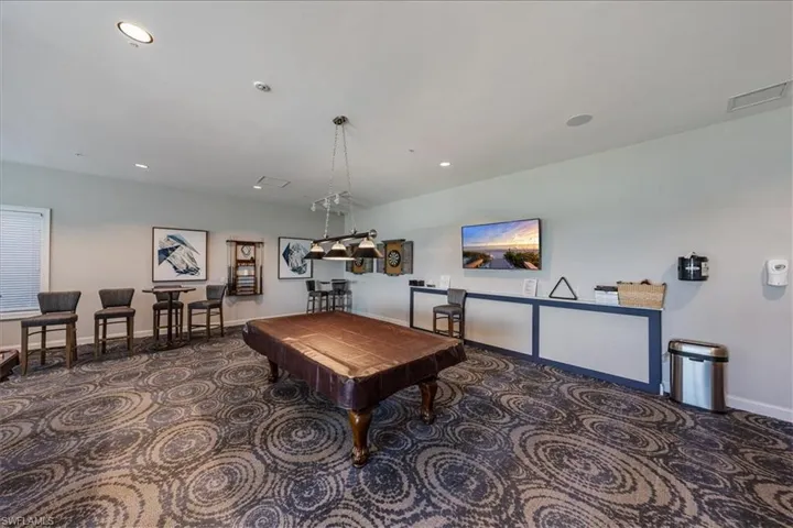 Del Webb Club House Amenities / Game room with dark carpet and pool table