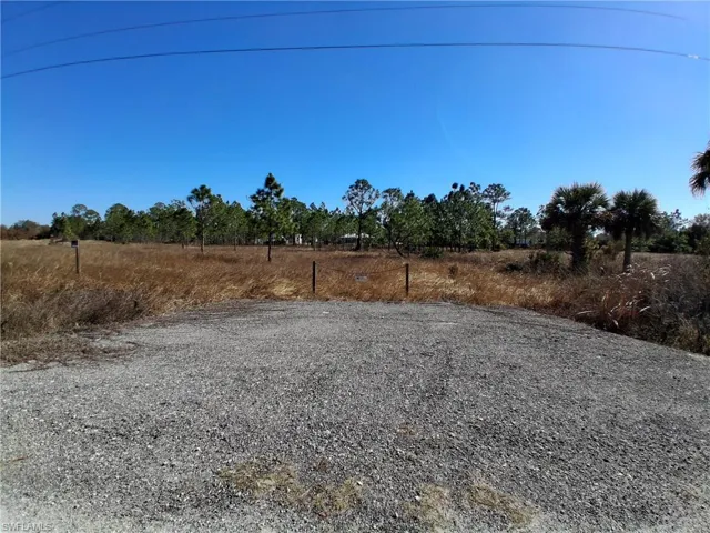 View of yard with a view of countryside
