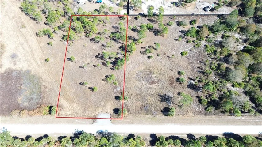 Overview of rural landscape featuring property parcel outlined