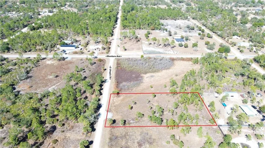 Aerial overview of property's location with property parcel outlined
