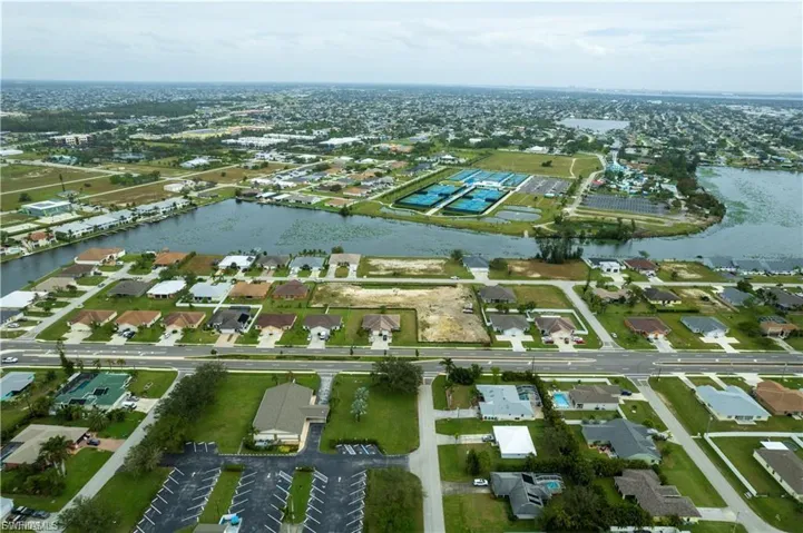 Aerial overview of property's location with nearby suburban area