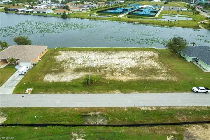 Aerial view of residential area with a large body of water