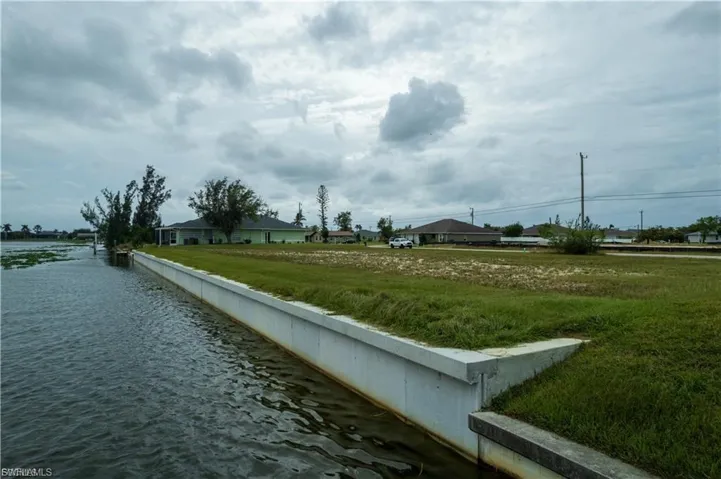 View of community with a water view