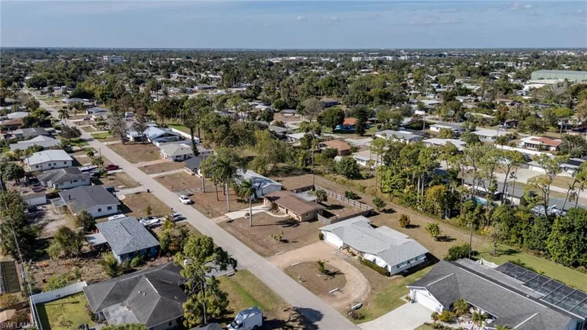 View of property location with nearby suburban area