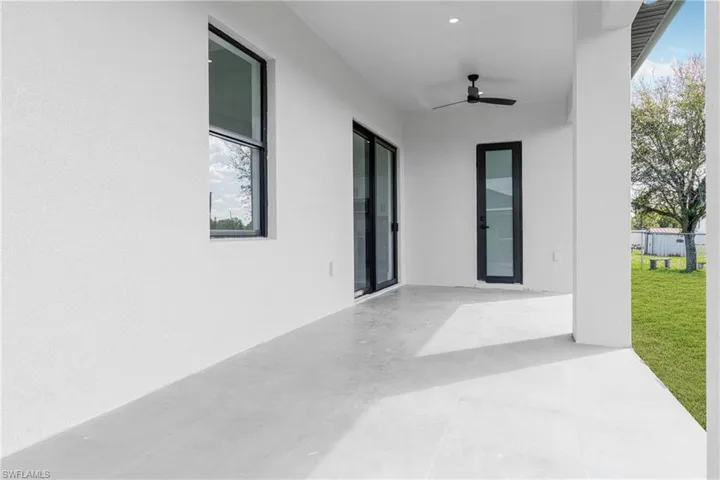 View of patio with ceiling fan