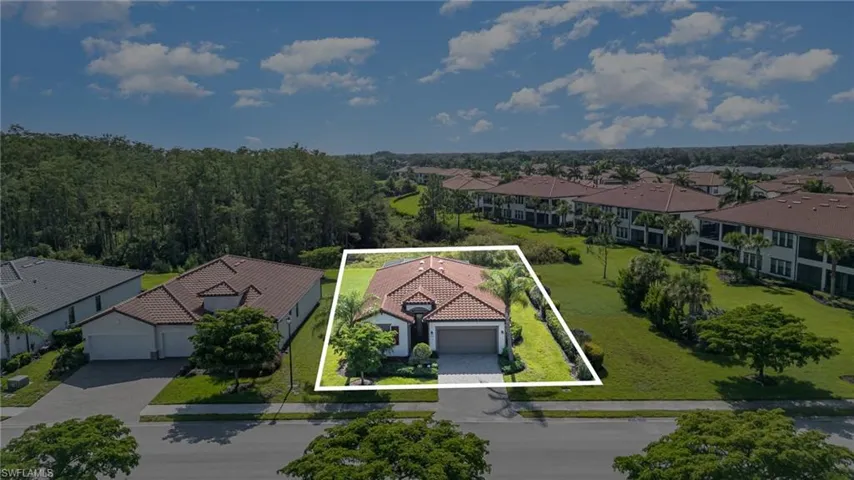 Aerial perspective of suburban area featuring property parcel outlined