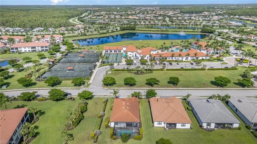 View of property location with nearby suburban area and a nearby body of water