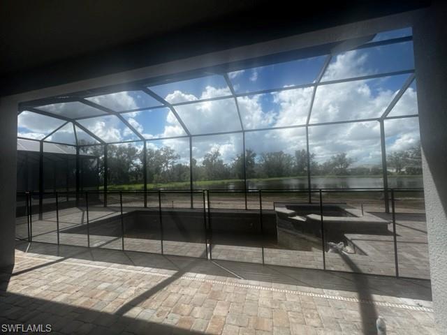 pool and spa under construction with water and preserve view